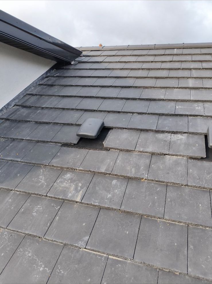 New roof vent tile fitted on a slate roof in Malahide, Co. Dublin